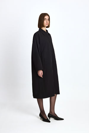 
                  
                    Raincoat "FIRST LADY" in Black
                  
                