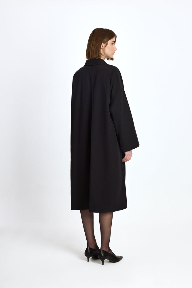 
                  
                    Raincoat "FIRST LADY" in Black
                  
                