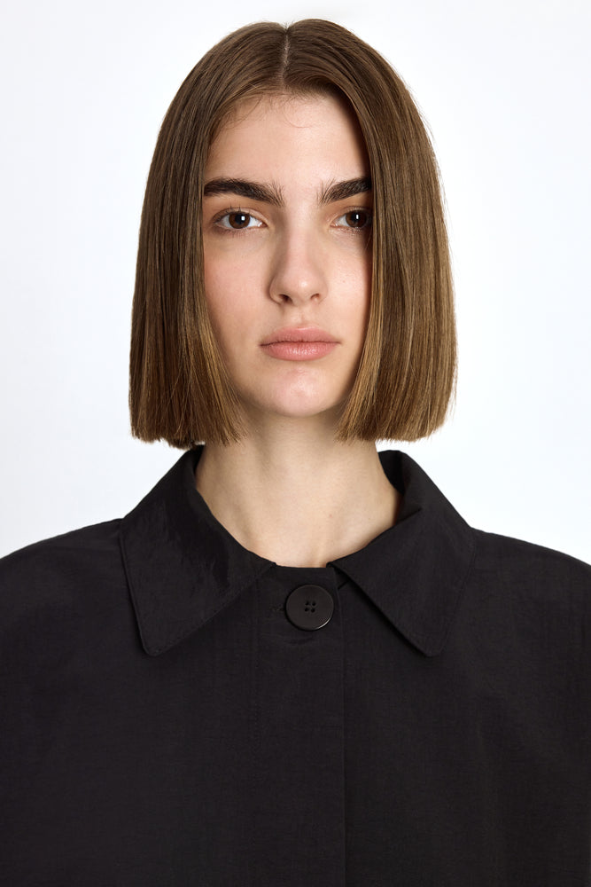
                  
                    Raincoat "FIRST LADY" in Black
                  
                