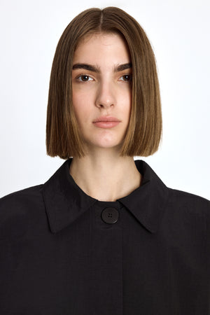 
                  
                    Raincoat "FIRST LADY" in Black
                  
                
