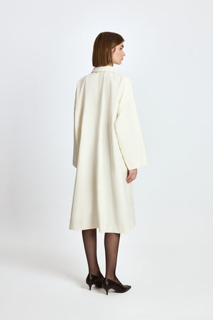 
                  
                    Raincoat "FIRST LADY" in Cream
                  
                